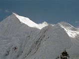 14 Chogolisa Late Afternoon From Shagring Camp On Upper Baltoro Glacier The southwest summit Chogolisa I (7665m) is on the left and the northeast summit Chogolisa II (7654m) is on the right, seen from Shagring camp on the Upper Baltoro Glacier. In 1909, a party led by Duke of the Abruzzi reached 7500m before being stopped by bad weather. Hermann Buhl and Kurt Diemberger attempted Chogolisa in 1957 after they had successfully summited Broad Peak a few weeks earlier. On June 25 they left camp I and camped in a saddle at 6706m on the southwest ridge. Bad weather forced them to retreat and on June 27 Buhl fell through a cornice and disappeared. His body has never been found.